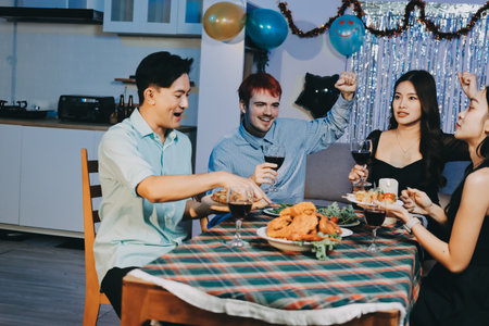 Diversity, dinner and group of people toast celebration together at party. Friends, happy and...