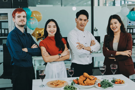 Diversity, dinner and group of people toast celebration together at party. Friends, happy and celebrate with food, wine and friendship for love, support and cheers champagne at business functionの写真素材