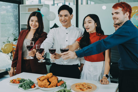 Diversity, dinner and group of people toast celebration together at party. Friends, happy and...