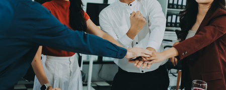 Diversity, dinner and group of people toast celebration together at party. Friends, happy and celebrate with food, wine and friendship for love, support and cheers at business functionの写真素材