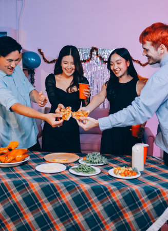 Diversity, dinner and group of people toast celebration together at party. Friends, happy and celebrate with food, wine and friendship for love, support and cheers champagne at business functionの写真素材