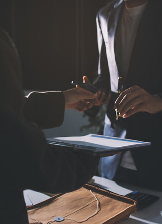 Lawyer explained to the client about the law that must be brought against the court case.