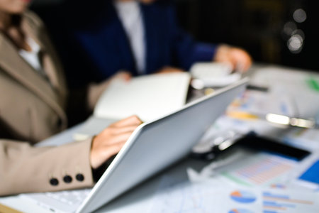 business people in meeting discussing plans togetherの写真素材