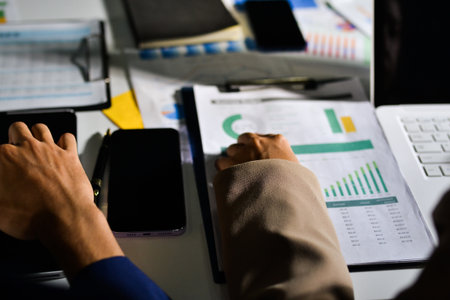 business people in meeting discussing plans togetherの写真素材