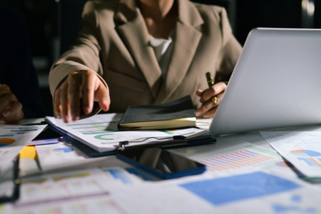 business people in meeting discussing plans togetherの写真素材