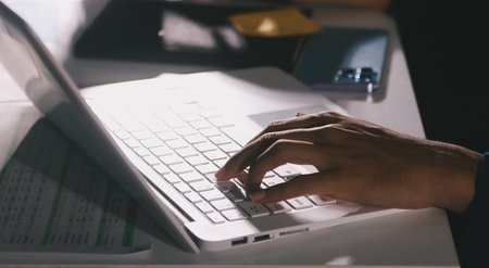 Business Team Analyzing Financial Data in Modern Officeの写真素材