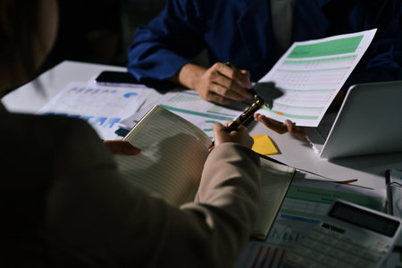 business people in meeting discussing plans together
