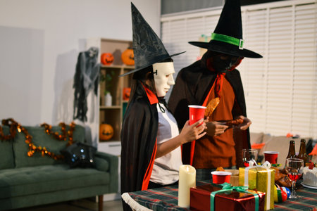 People having fun at Halloween partyの写真素材