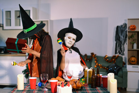 People having fun at Halloween partyの写真素材