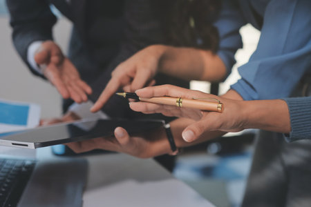 Accounting company provide finance and taxation planning for profitable cash flow, Auditor and accountant team working in office, analyze financial data and accounting record with calculator.Insightの写真素材