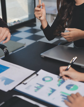 Accounting company provide finance and taxation planning for profitable cash flow, Auditor and accountant team working in office, analyze financial data and accounting record with calculator.Insightの写真素材