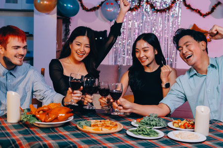 Diversity, dinner and group of people toast celebration together at party. Friends, happy and celebrate with food, wine and friendship for love, support and cheers champagne at business functionの写真素材