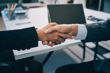 Accounting company provide finance and taxation planning for profitable cash flow, Auditor and accountant team working in office, analyze financial data and accounting record with calculator.の写真素材