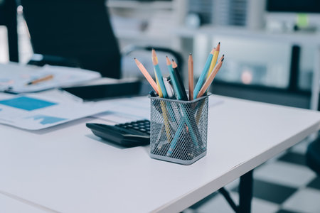 Accounting company provide finance and taxation planning for profitable cash flow, Auditor and accountant team working in office, analyze financial data and accounting record with calculator.の写真素材