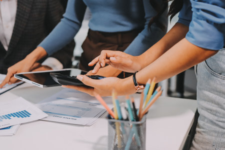 Accounting company provide finance and taxation planning for profitable cash flow, Auditor and accountant team working in office, analyze financial data and accounting record with calculator.Insightの写真素材