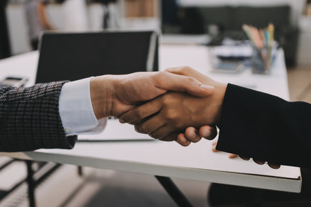 Accounting company provide finance and taxation planning for profitable cash flow, Auditor and accountant team working in office, analyze financial data and accounting record with calculator.の写真素材