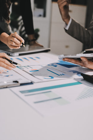 Accounting company provide finance and taxation planning for profitable cash flow, Auditor and accountant team working in office, analyze financial data and accounting record with calculator.Insightの写真素材