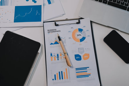 Accounting company provide finance and taxation planning for profitable cash flow, Auditor and accountant team working in office, analyze financial data and accounting record with calculator.Insightの写真素材