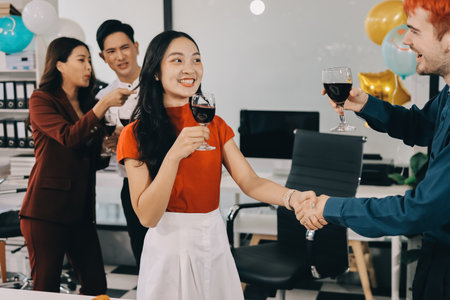 Diversity, dinner and group of people toast celebration together at party. Friends, happy and celebrate with food, wine and friendship for love, support and cheers at business functionの写真素材