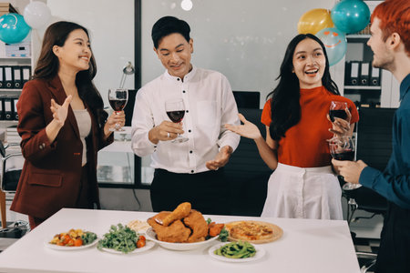 Diversity, dinner and group of people toast celebration together at party. Friends, happy and...
