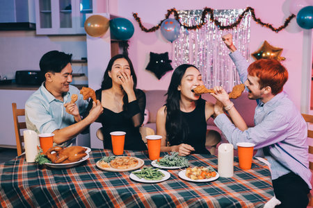 Diversity, dinner and group of people toast celebration together at party. Friends, happy and...