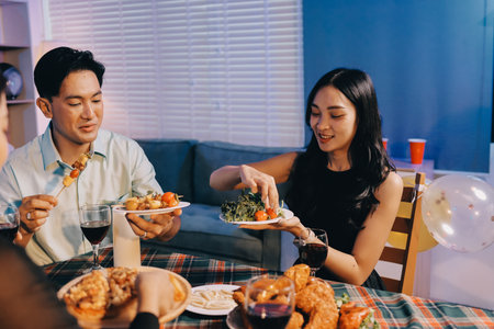 Diversity, dinner and group of people toast celebration together at party. Friends, happy and...
