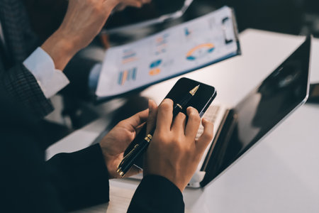 Accounting company provide finance and taxation planning for profitable cash flow, Auditor and accountant team working in office, analyze financial data and accounting record with calculator.Insightの写真素材