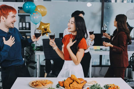 Diversity, dinner and group of people toast celebration together at party. Friends, happy and celebrate with food, wine and friendship for love, support and cheers champagne at business functionの写真素材