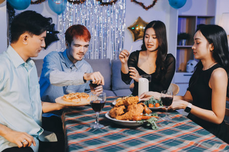 Diversity, dinner and group of people toast celebration together at party. Friends, happy and...