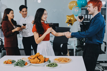 Diversity, dinner and group of people toast celebration together at party. Friends, happy and celebrate with food, wine and friendship for love, support and cheers champagne at business functionの写真素材