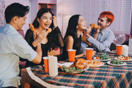 Diversity, dinner and group of people toast celebration together at party. Friends, happy and celebrate with food, wine and friendship for love, support and cheers champagne at business functionの写真素材