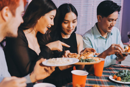 Diversity, dinner and group of people toast celebration together at party. Friends, happy and celebrate with food, wine and friendship for love, support and cheers champagne at business functionの写真素材