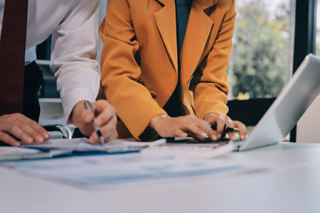 Auditor and accountant team working in office, analyze financial data and accounting record with calculator.の写真素材