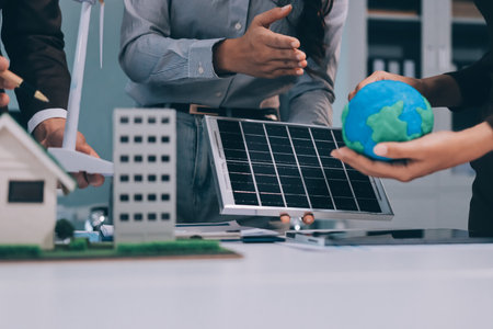 Group of businesspeople in team brainstorm meeting discussion on ESG (Environmental, social, corporate governance) organization planning. Sustainable business, coworker people teamwork. Close upの写真素材