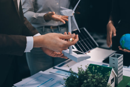 Group of businesspeople in team brainstorm meeting discussion on ESG (Environmental, social, corporate governance) organization planning. Sustainable business, coworker people teamwork. Close upの写真素材