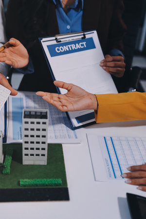 Real estate agent and customer signing contract to buy house, insurance or loan real estate.rent a house,get insurance or loan real estate or property.の写真素材