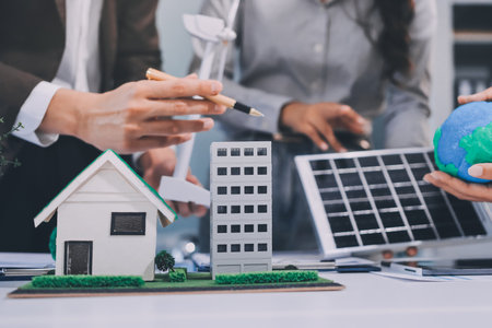 Group of businesspeople in team brainstorm meeting discussion on ESG (Environmental, social, corporate governance) organization planning. Sustainable business, coworker people teamwork. Close upの写真素材