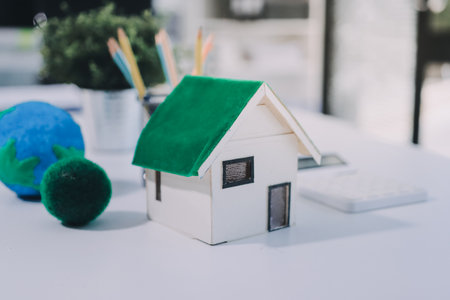 Group of businesspeople in team brainstorm meeting discussion on ESG (Environmental, social, corporate governance) organization planning. Sustainable business, coworker people teamwork. Close upの写真素材