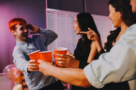 Diversity, dinner and group of people toast celebration together at party. Friends, happy and celebrate with food, wine and friendship for love, support and cheers at business functionの写真素材