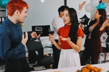 Diversity, dinner and group of people toast celebration together at party. Friends, happy and celebrate with food, wine and friendship for love, support and cheers champagne at business functionの写真素材