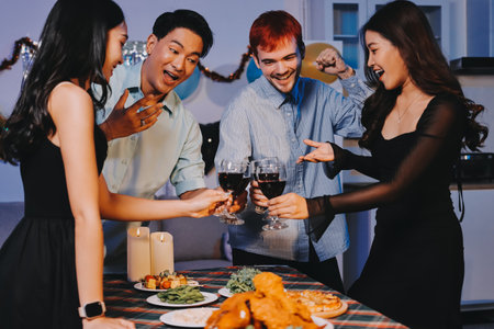 Diversity, dinner and group of people toast celebration together at party. Friends, happy and celebrate with food, wine and friendship for love, support and cheers champagne at business functionの写真素材