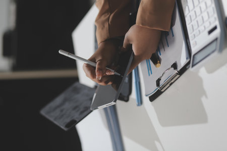 Entrepreneurs and business people conference in modern meeting room, happy multiracial coworkers have fun cooperating working together at office meetingの写真素材