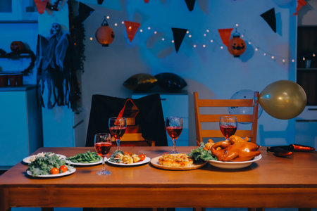 Joyful Halloween party with coworkers in costumes, celebrating with drinks and laughter, fostering teamwork and festive spiritの写真素材