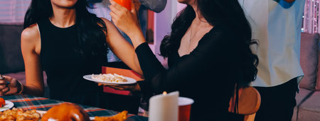 Diversity, dinner and group of people toast celebration together at party. Friends, happy and celebrate with food, wine and friendship for love, support and cheers champagne at business functionの写真素材