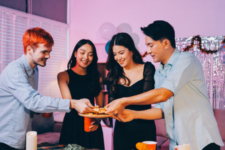 Diversity, dinner and group of people toast celebration together at party. Friends, happy and celebrate with food, wine and friendship for love, support and cheers champagne at business functionの写真素材