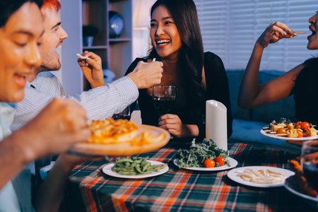 Diversity, dinner and group of people toast celebration together at party. Friends, happy and celebrate with food, wine and friendship for love, support and cheers champagne at business functionの写真素材