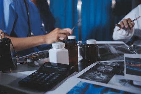 Doctors are meeting at the hospital to discuss treatment options and share experiences with...