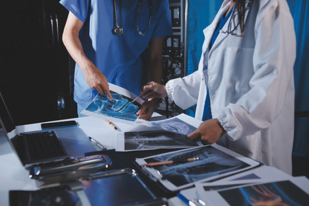 Doctors are meeting at the hospital to discuss treatment options and share experiences with...