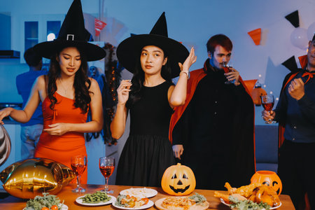Joyful Halloween party with coworkers in costumes, celebrating with drinks and laughter, fostering...
