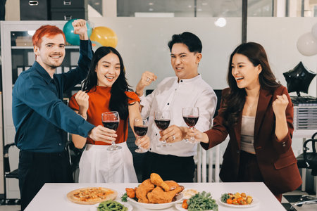 Diversity, dinner and group of people toast celebration together at party. Friends, happy and celebrate with food, wine and friendship for love, support and cheers champagne at business functionの写真素材